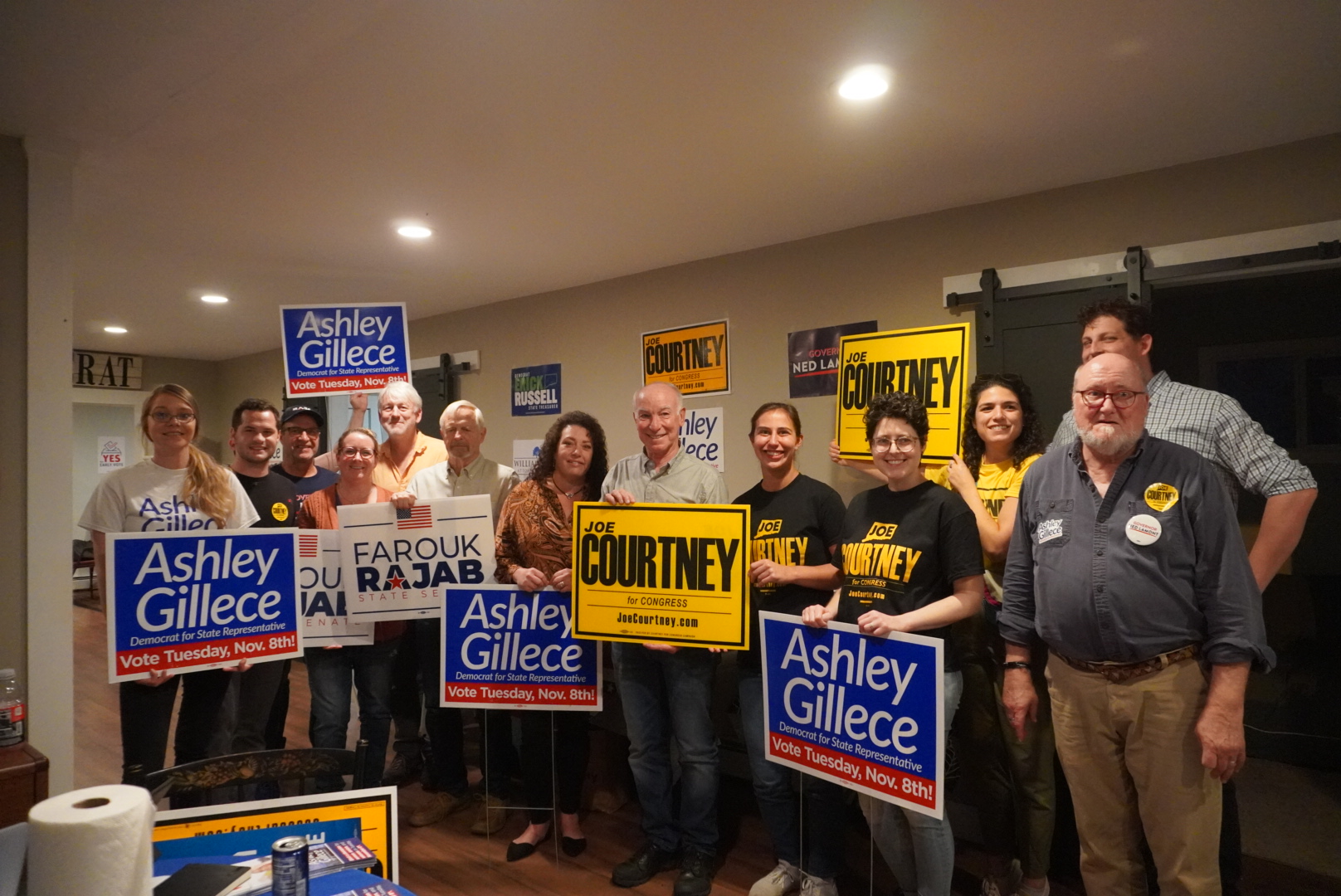 group of people holding political signs